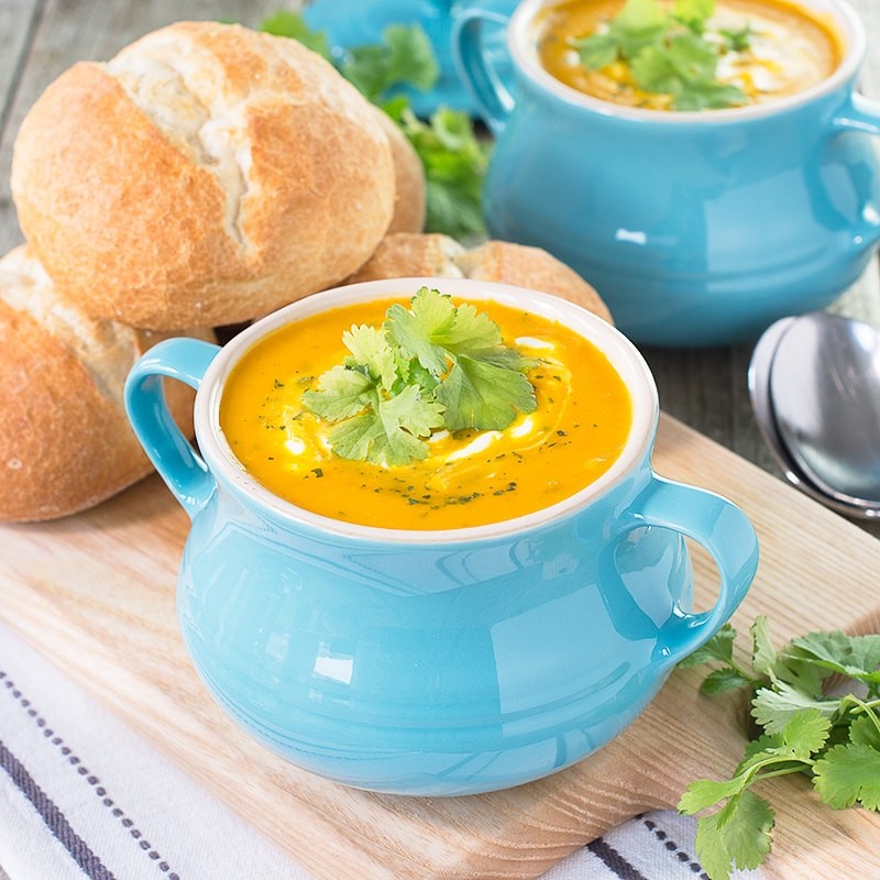 Picture of carrot soup with crusty roll